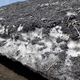 Illustration for article titled This Trash-Covered Glacier Is a Monument to Boston's Godawful Winter